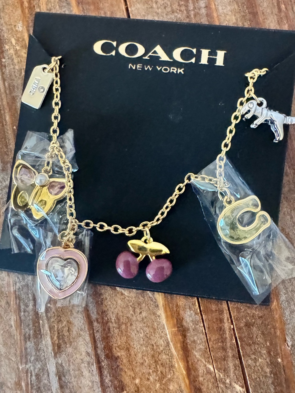 Coach Cherry Butterfly Charm Bracelet NWOT - Picture 2 of 12